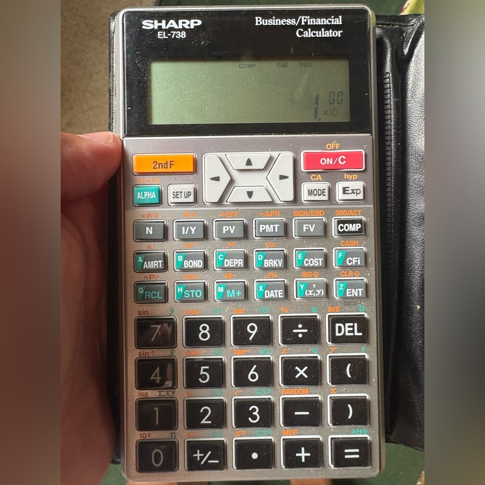 Sharp EL-738 business financial  Calculator with Black and Silver Design